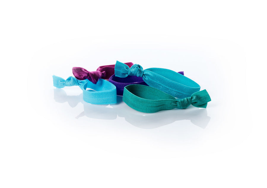 Vibrant - InStyler All Tied Up Hair Ties-Five ties in amethyst, aqua, turquoise, emerald and ruby laid on white background.