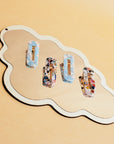 Hair Barrettes -- InStyler-Lifestyle photo of 2 multi-colored and blue and white barrettes.