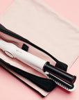 Heat Resistant Travel Bag -- InStyler-Photo of bag with hot roller inside.