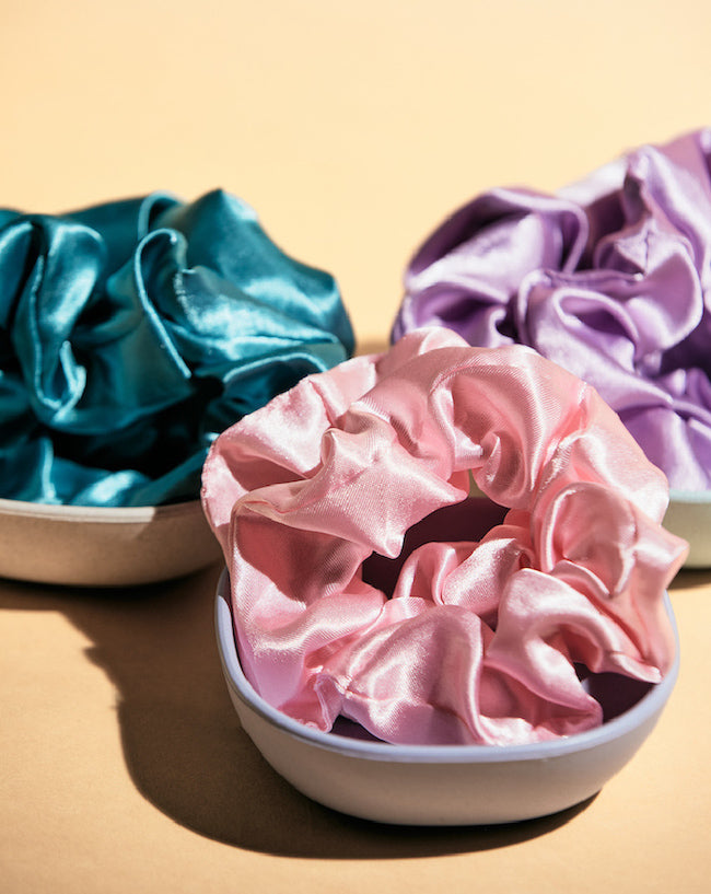 Satin Scrunchie Set -- InStyler-Close up of three scrunchies in pink, turquoise and lavender
