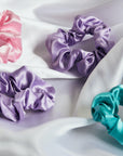 Satin Scrunchie Set -- InStyler-Close up of scrunchies in pink, lavender and turquoise