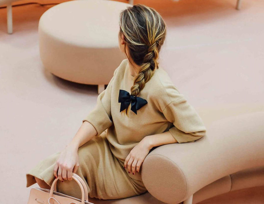 Girl looking backwards with braid