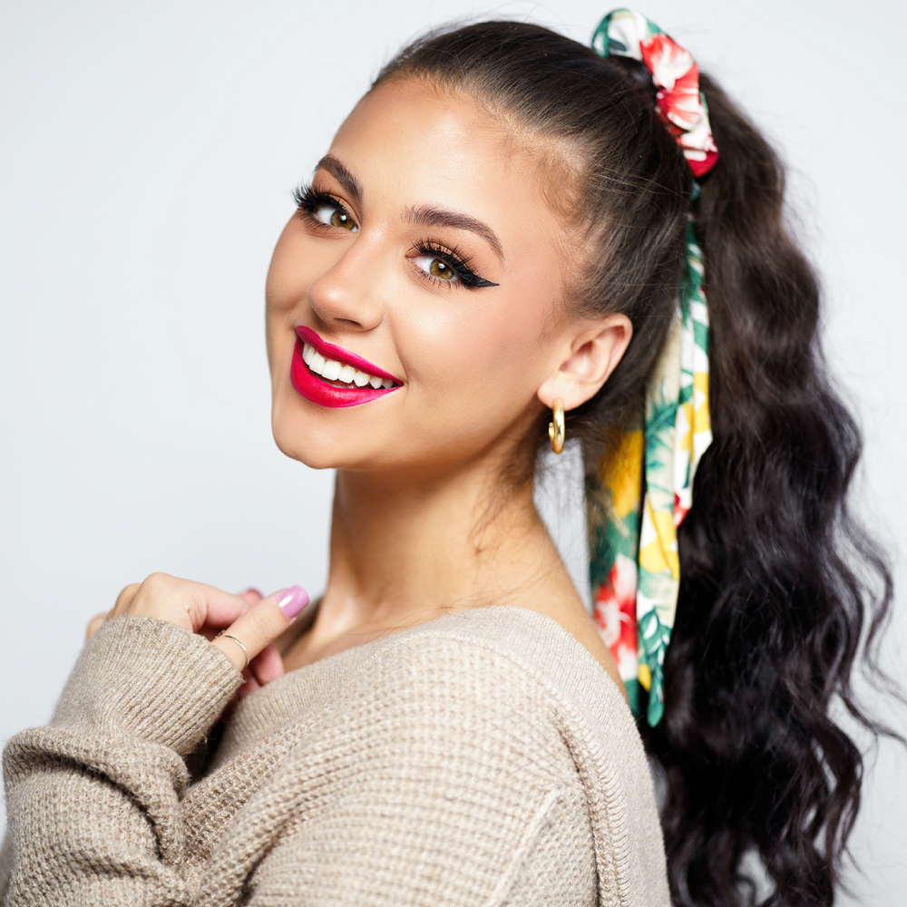 Scarf Scrunchie Set -- InStyler-Model with long black hair with red and orange floral scrunchie on her ponytail 