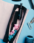 Heat Resistant Travel Bag -- InStyler-photo with comb, spray bottle and scrunchies inside.