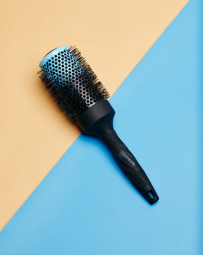 Lifestyle photo of Thermal 2" Round Brush -- InStyler